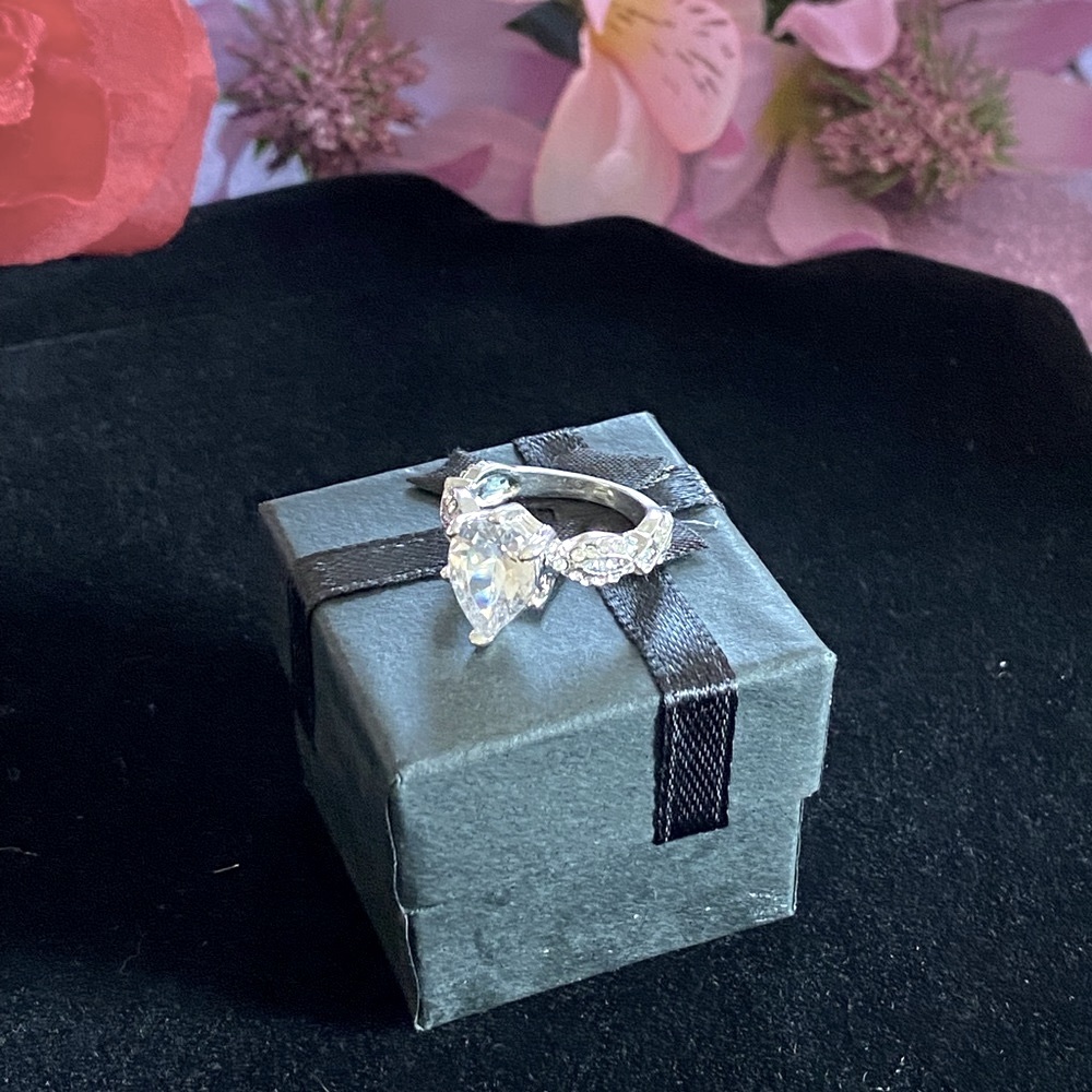 Sterling Silver, white Sapphire Pear cut Ring, NIB, size 5.